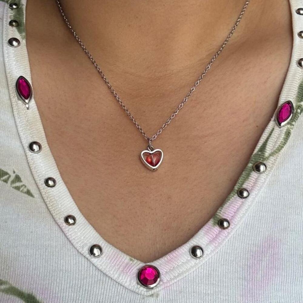 Silver heart pendant necklace with
